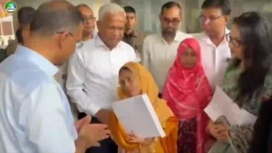 বিশেষ চাহিদাসম্পন্ন তিন ব্যক্তির হাতে নিয়োগপত্র তুলে দিচ্ছেন প্রধানমন্ত্রী